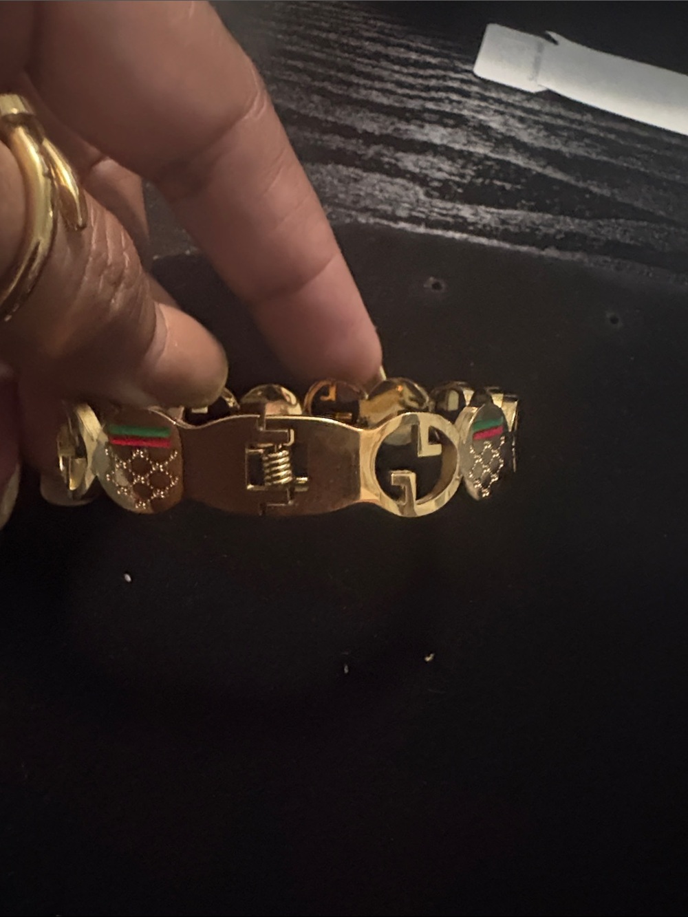 Gold-Tone Interlocking Logo Bracelet with Green and Red Accents